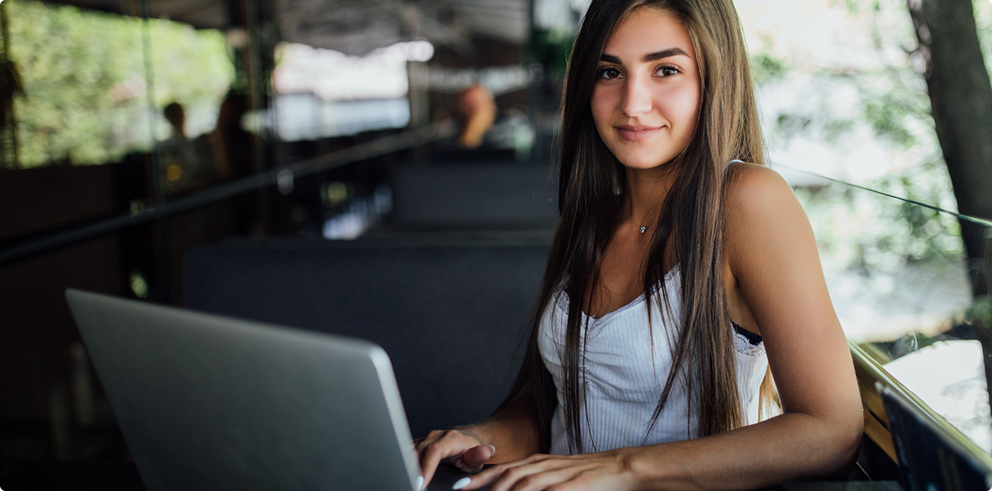 student with computer